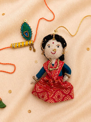 Radha Bansuri Rakhi Lumba Set | Set Of 2 | Red Weave & Yellow