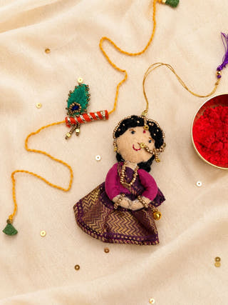 Radha Bansuri Rakhi Lumba Set | Set Of 2 | Purple Brocade & Orange