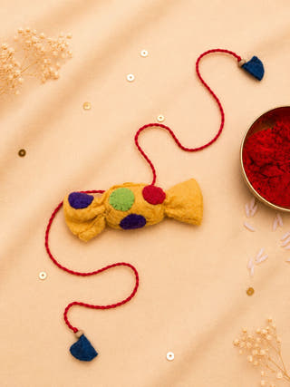 Hand Embroidered Toffee Rakhi | Yellow