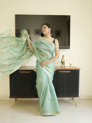 Green Tissue Linen Saree With Zari Border