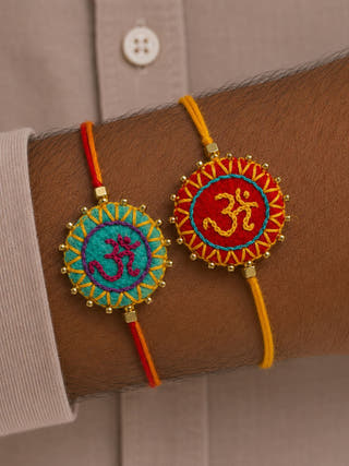 Hand Embroidered Aum Mandala Rakhi | Set Of 2 | Sea Green & Red