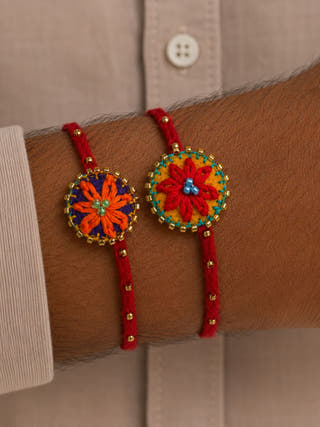 Hand Embroidered Flower Daisy Rakhi | Set Of 2 | Red & Orange