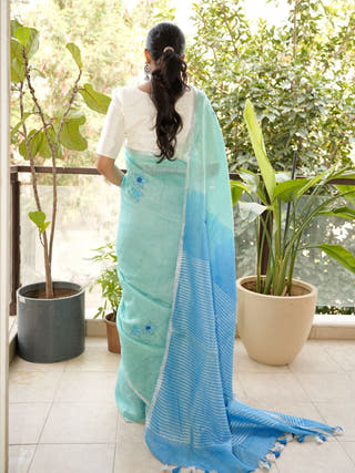 Aqua Blue Linen Saree with Hand Embroidered Floral Motifs