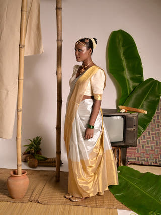 Kanakvarna Metallic White And Gold Tissue Saree