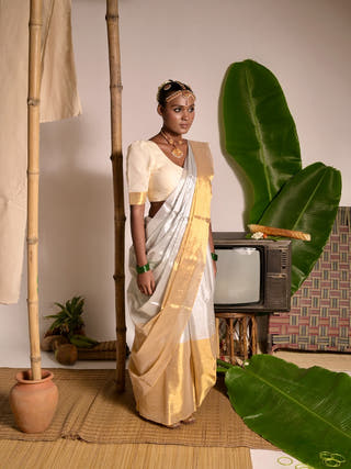 Kanakvarna Metallic White And Gold Tissue Saree