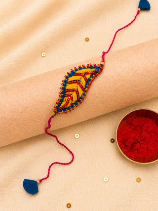 Hand Embroidered Leaf Ornamental Rakhi | Yellow