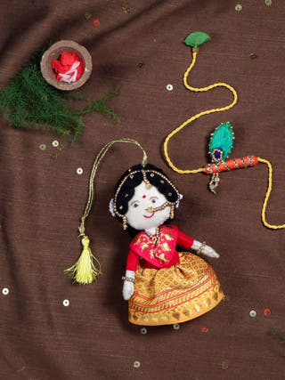 Radha Bansuri Rakhi Lumba Set | Set Of 2  | Yellow Brocade & Orange