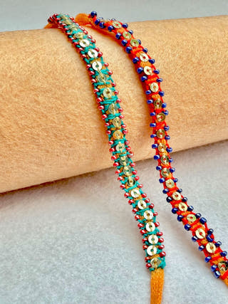Hand Embroidered Blanket Stitch Rakhi | Set Of 2 | Sea Green & Red