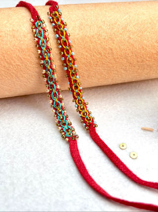 Hand Embroidered Double Leheriya Rakhi | Set Of 2 | Blue & Yellow