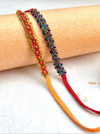 Hand Embroidered Double Leheriya Rakhi | Set Of 2 | Sea Green & Red