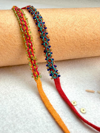 Hand Embroidered Double Leheriya Rakhi | Set Of 2 | Sea Green & Red