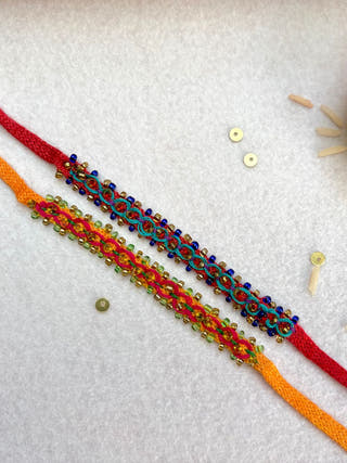 Hand Embroidered Double Leheriya Rakhi | Set Of 2 | Sea Green & Red