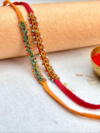 Hand Embroidered Double Leheriya Rakhi | Set Of 2 | Sea Green & Yellow