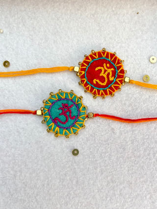Hand Embroidered Aum Mandala Rakhi | Set Of 2 | Sea Green & Red