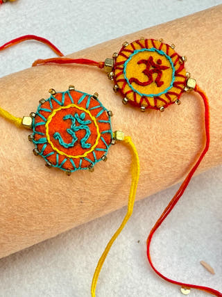 Hand Embroidered Aum Mandala Rakhi | Set Of 2 | Orange & Yellow