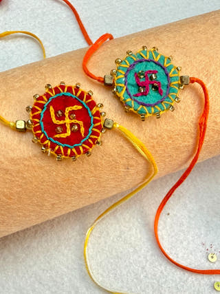 Hand Embroidered Swastika Mandala Rakhi | Set Of 2 | Red & Sea Green