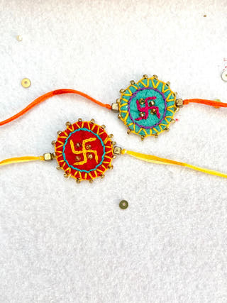 Hand Embroidered Swastika Mandala Rakhi | Set Of 2 | Red & Sea Green
