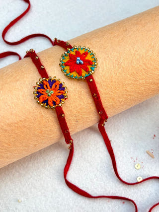 Hand Embroidered Flower Daisy Rakhi | Set Of 2 | Red & Orange