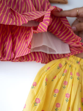 Meera Pink Striped Halter Choli And Yellow Floral Booti Lehenga Set