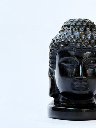 Black Obsidian Buddha Face Hand Carved Crystal