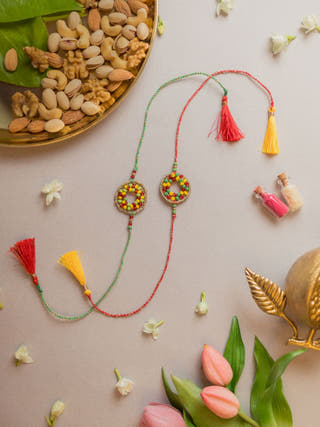 Rainbow Threads Crochet Rakhi (Set Of 2)