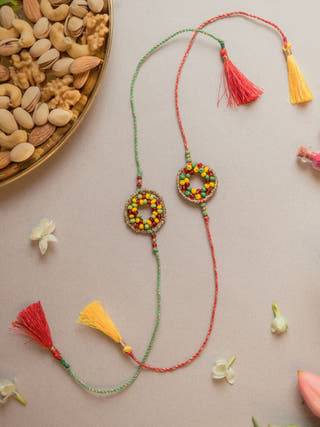Rainbow Threads Crochet Rakhi (Set Of 2)