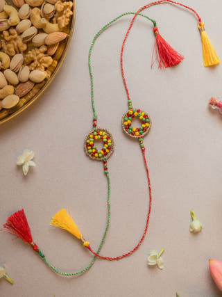 Rainbow Threads Crochet Rakhi (Set Of 2)