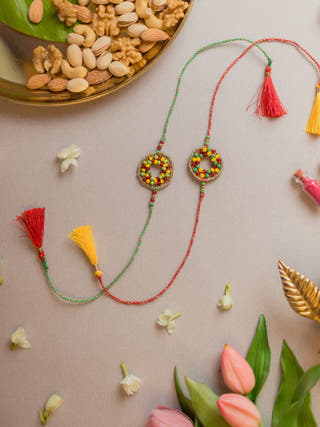 Rainbow Threads Crochet Rakhi (Set Of 2)