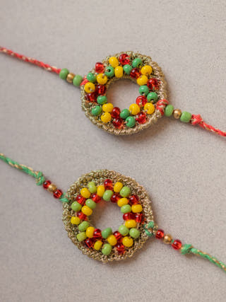 Rainbow Threads Crochet Rakhi (Set Of 2)