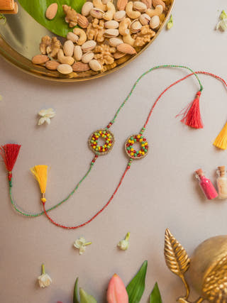Rainbow Threads Crochet Rakhi (Set Of 2)