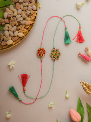 Jewelled Flowers Crochet Rakhi (Set Of 2)