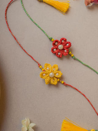 Red And Yellow Crochet Rakhi (Set Of 2)
