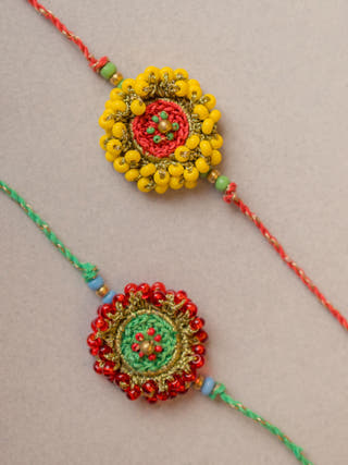 Beaded Glow Crochet Rakhi (Set Of 2)
