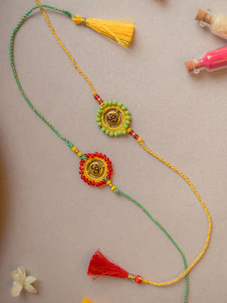 Om Aura Crochet Rakhi (Set Of 2)