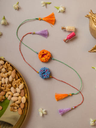 Coral Bead Crochet Rakhi (Set Of 2)
