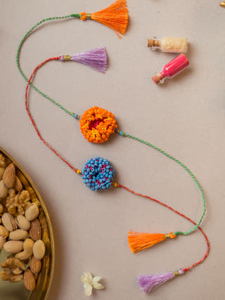 Coral Bead Crochet Rakhi (Set Of 2)