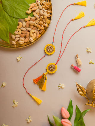 Marigold Crochet Rakhi & Lumba Set (Set Of 2)