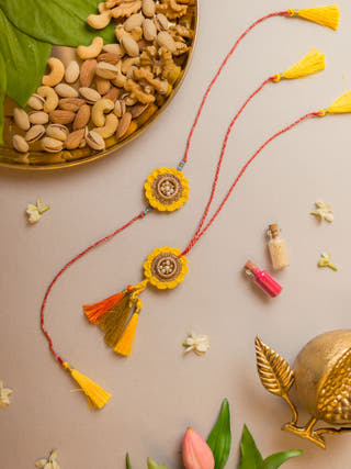 Marigold Crochet Rakhi & Lumba Set (Set Of 2)