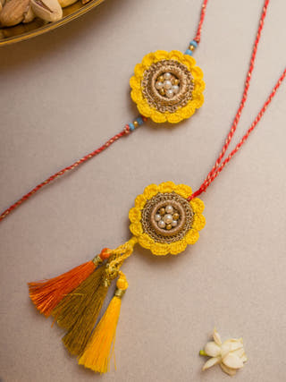 Marigold Crochet Rakhi & Lumba Set (Set Of 2)