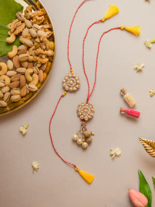 Celestial Crochet Rakhi & Lumba Set (Set Of 2)