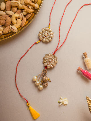 Celestial Crochet Rakhi & Lumba Set (Set Of 2)