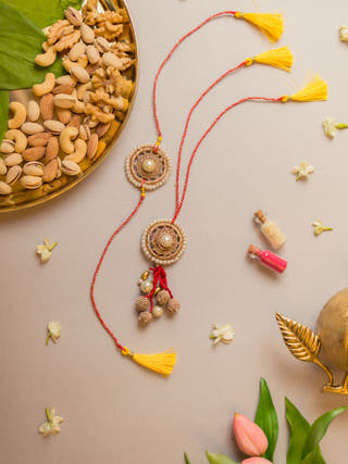 Antique Pearl Crochet Rakhi & Lumba Set (Set Of 2)