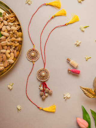 Antique Pearl Crochet Rakhi & Lumba Set (Set Of 2)