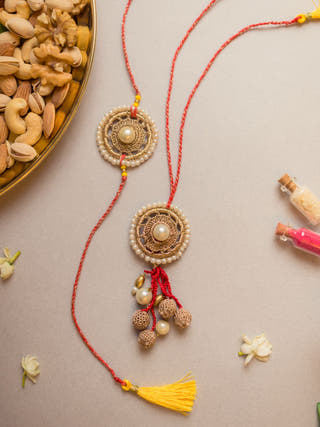 Antique Pearl Crochet Rakhi & Lumba Set (Set Of 2)