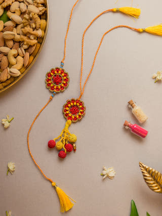 Red Mandala Crochet Rakhi & Lumba Set (Set Of 2)
