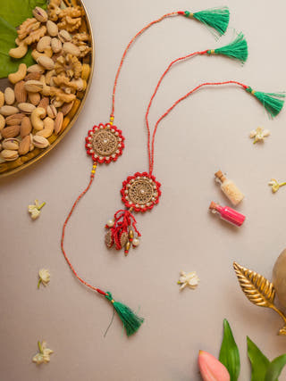 Festive Red Crochet Rakhi & Lumba Set (Set Of 2)