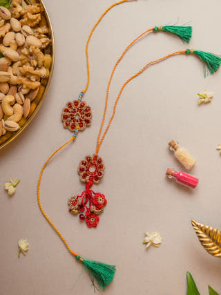 Red Stone Crochet Rakhi & Lumba Set (Set Of 2)