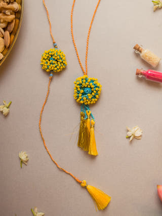 Yellow Coral Crochet Rakhi & Lumba Set (Set Of 2)