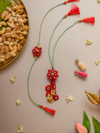 Red Flower Crochet Rakhi & Lumba Set (Set Of 2)