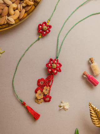 Red Flower Crochet Rakhi & Lumba Set (Set Of 2)